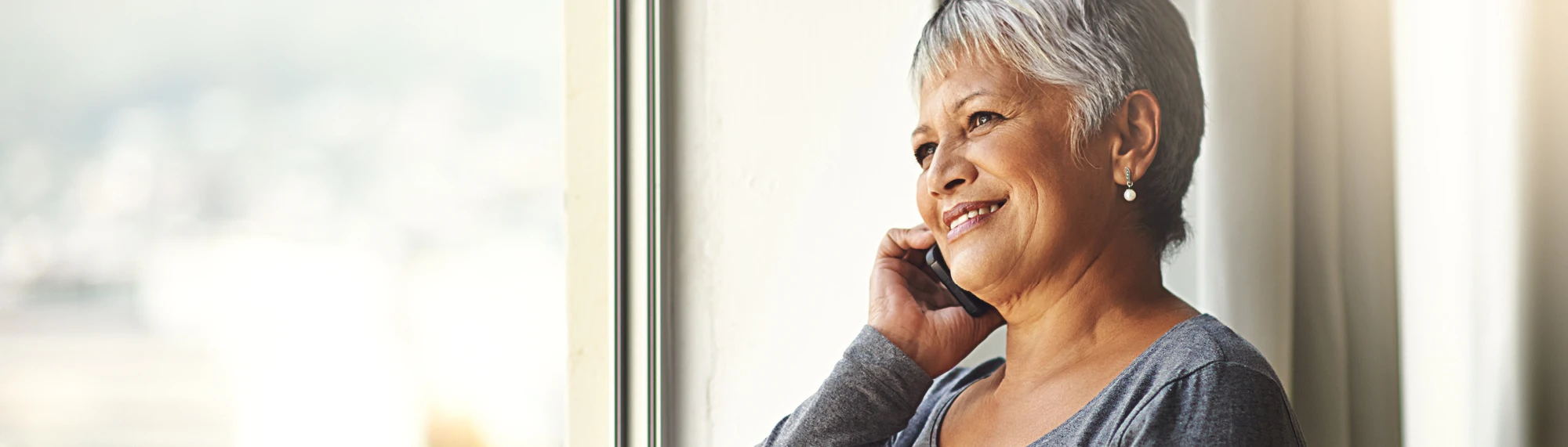 older african american woman on cell phone