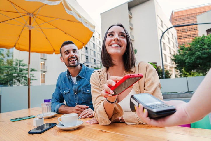 couple using tap to pay