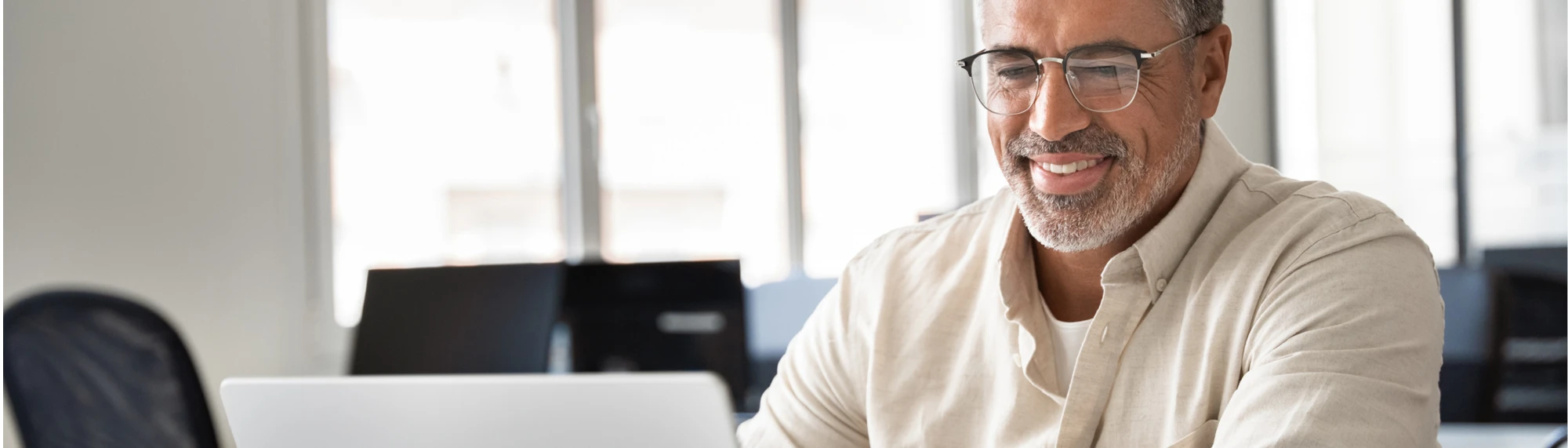 hispanic man on laptop